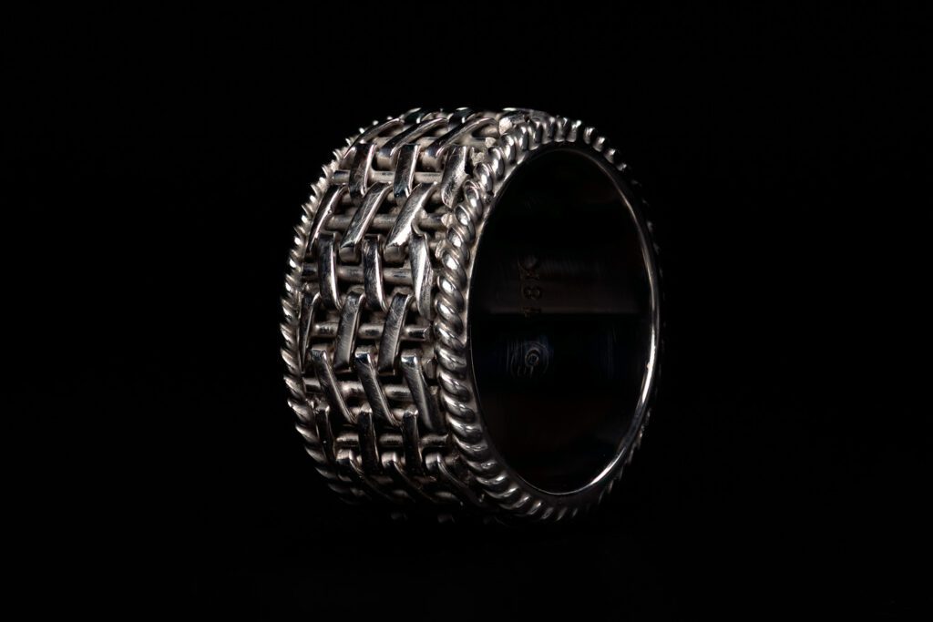 White Gold handmade basket weave braided mens wedding band by Elier Olivos for Scott Schaefer of Schaefer Photography.