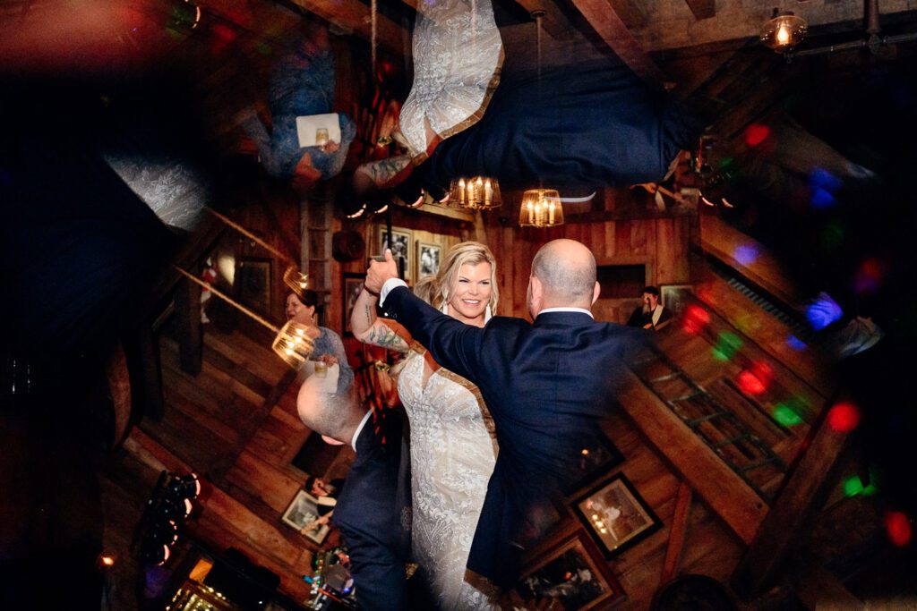 Bride and groom dance through reflections during dogwood canyon wedding reception schaefer photography