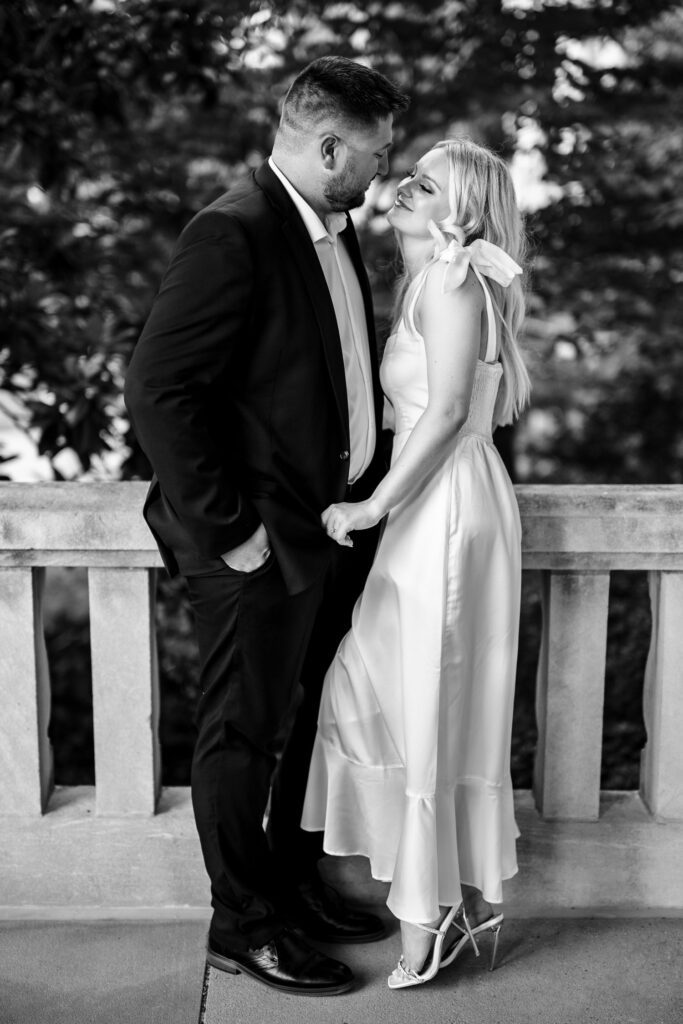 Couple laughing on Jesse Hall Steps.